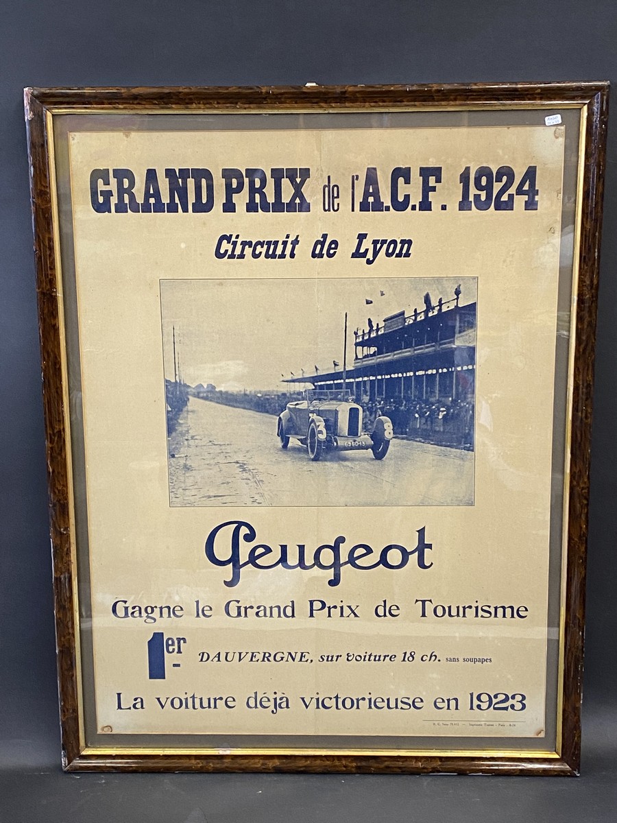 A framed and glazed 1924 advertisement for the Lyon Grand Prix, depicting a 1923 winning Peugeot, 27