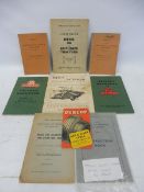 A selection of motoring volumes, including a Dunlop price list, gun tractor maintenance etc.