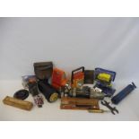 A quantity of garage equipment to include a UCL gun, a glass motorcycle battery etc.