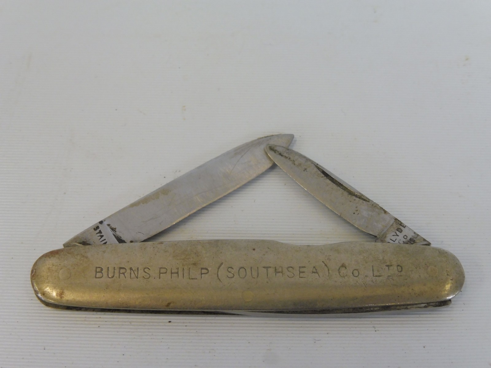 A Dunlop Tyres penknife marked to the reverse: Burns Philp (Southsea) Co. Ltd. - Image 2 of 2