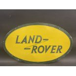 A Land Rover oval tin advertising sign, dated July 1959, 29 1/2 x 18".