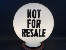 A 'Not For Resale' glass pill shaped petrol pump globe by Hailware, large chip to neck, otherwise