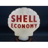 A Shell Economy glass petrol pump globe by Hailware, damage to neck and most pieces appear