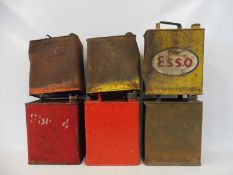 Six 2 gallon petrol cans including Shell and Esso.