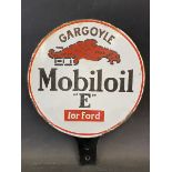 A Gargoyle Mobiloil 'E' for Ford circular double sided enamel bulk tank tag with some restoration at