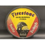 A Firestone Gum-Dipped Tyres pictorial circular hardboard advertising sign lithographed in USA,