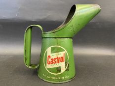 A Wakefield Castrol Motor Oil pint measure, dated August 1952.