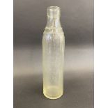 A Caltex pint glass oil bottle.