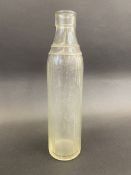 A Caltex pint glass oil bottle.