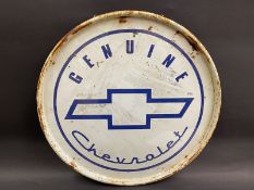 A 1950s/1960s single sided 'Genuine Chevrolet' tin showroom advertising sign, 23" diameter.