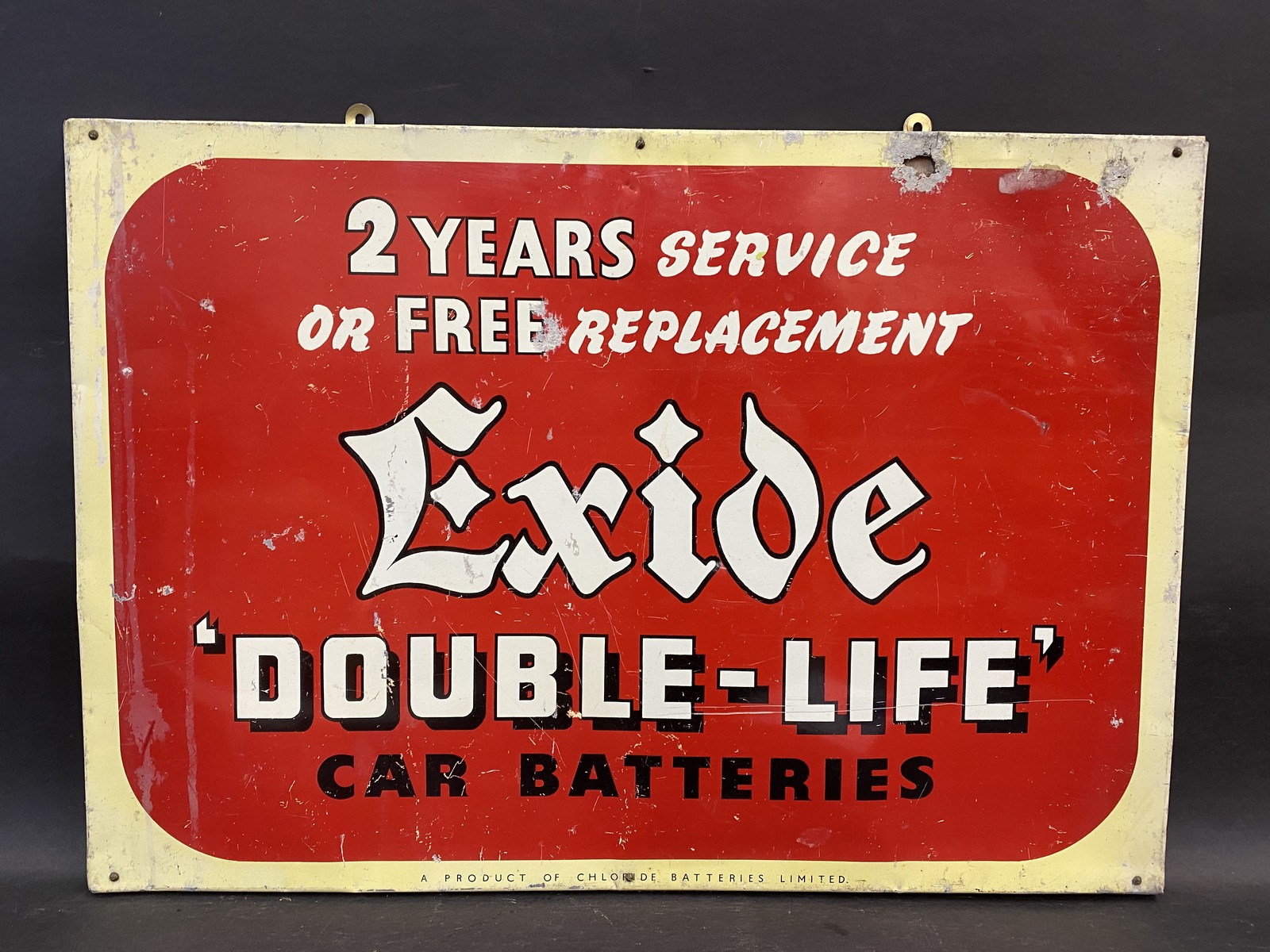 An Exide 'Double-Life' Car Batteries aluminium sign, mounted on board, 24 1/2 x 17".