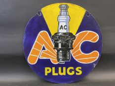 A rarely seen AC Plugs circular double sided enamel sign with some high quality professional