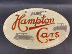 A rare Hampton Cars oval glass advertisig sign on hanging chains, unusually promoting a Ford Model T