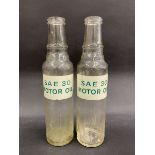 Two rare S.A.E. 30 glass pint oil bottles.