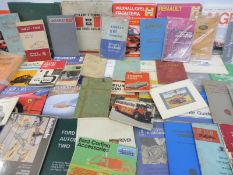 Two boxes of motoring manuals including Simca, Thames, Triumph etc.