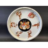 An Esso 'Tiger' circular serving tray with images all round, 13" diameter.