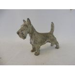 A well defined standing scottie dog, possibly a mascot.