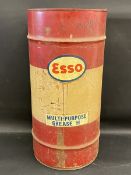 An Esso grease drum of large size.