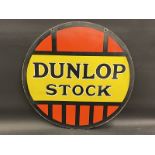 A Dunlop Stock circular double sided enamel sign, 23 3/4" diameter.