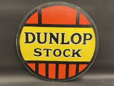 A Dunlop Stock circular double sided enamel sign, 23 3/4" diameter.