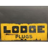 A Lodge Plugs rectangular enamel sign, 48 x 18".