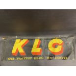 A KLG 'The Fastest Plug on Earth' rectangular banner on a hanging timber, 46 x 14".