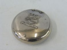 A Mex Motor Spirit plated snuff box, 3" diameter.