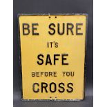 A cast aluminium road sign 'Be Sure it's Safe Before You Cross' with maker's mark Thetford,