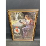 A framed and glazed reproduction Lucas Lamps pictorial advertisement, 17 1/2 x 25".