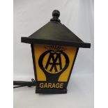 An AA Garage glass lantern on a long bracket, lantern measures 16 1/2" square x approx 27" high.