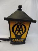 An AA Garage glass lantern on a long bracket, lantern measures 16 1/2" square x approx 27" high.