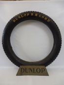 A Dunlop Garage forecourt tyre stand with an original Dunlop Cord tyre (for display purposes only).