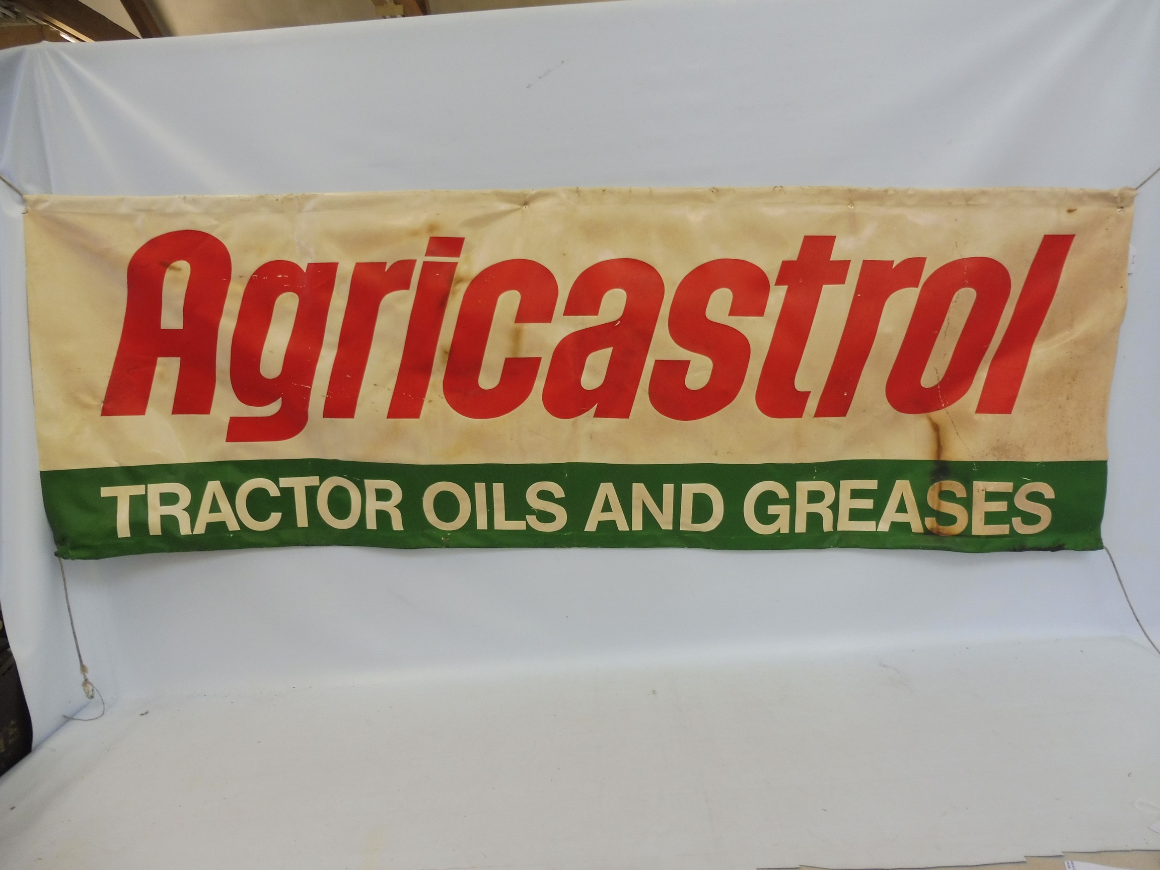 An Agricultural Tractor Oils and Greases banner, 70 x 24".