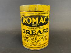 A Romac Superfine Grease tin of bright colour.