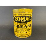 A Romac Superfine Grease tin of bright colour.
