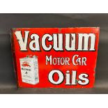 A Vacuum Motor Car Oils double sided enamel sign with hanging flange and rectangular quart can