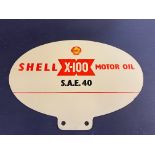 A new old stock Shell X-100 motor oil cabinet advertising garage sign, circa 1950s/1960s.