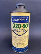 A Duckham's Q20-50 Multigrade Engine Oil cylindrical quart can.