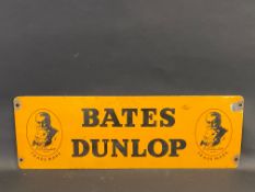 A Bates Dunlop rectangular enamel sign of small size with an image of J.B. Dunlop to each end, 24