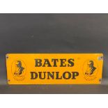 A Bates Dunlop rectangular enamel sign of small size with an image of J.B. Dunlop to each end, 24