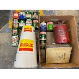 A box of mostly grease tins plus other cans including Esso.