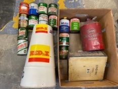 A box of mostly grease tins plus other cans including Esso.