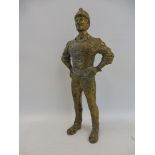 A brass standing advertising figure from Esso, 12" high.