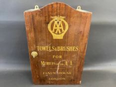 A rarely seen AA wall hanging cupboard containing 'Towels & Brushes for Members of the AA', Fanum