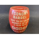 An unusual tin barrel-shaped money box advertising Dodge cars.