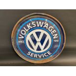 A contemporary VW Service circular metal sign, 24" diameter.