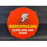 A Michelin bicycle pictorial hardboard advertising sign, 24" diameter.