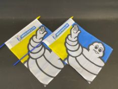 Two Michelin tyre advertising flags.