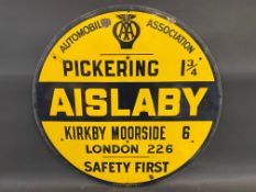 An AA circular road/village sign for Aislaby, Pickering 1 3/4 miles, by Franco, 30" diameter.