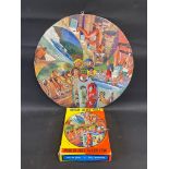 A boxed Waddingtons circular jigsaw puzzle 'Champions of Sport'.